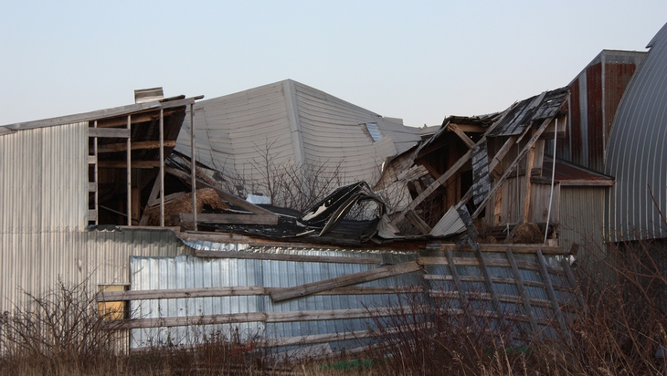 Partial collapse of a farm building