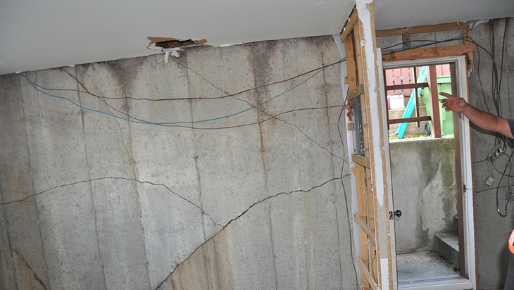 Foundation wall highly damaged by backfill frost